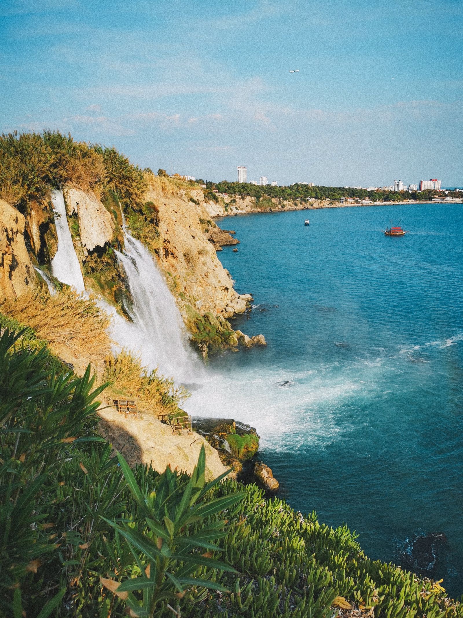 Lower Düden waterfall flowing from the cliffs into the Mediterranean Sea